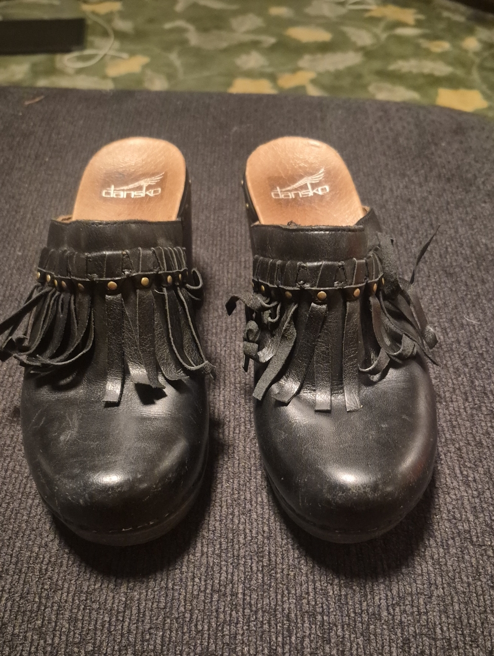 Dansko Black Leather Fringe Clog Mules with Stud Accents